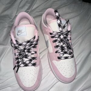 Woman dunks Pink Foam